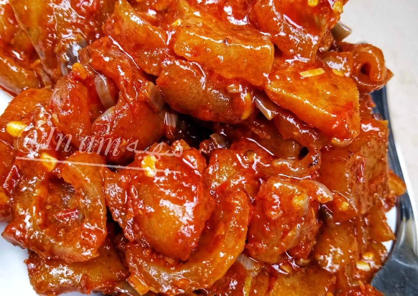 Peppered Kpomo